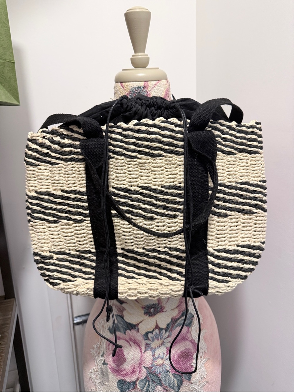 Woven Straw Tote Bag with Black Stripes and Drawstring Closure